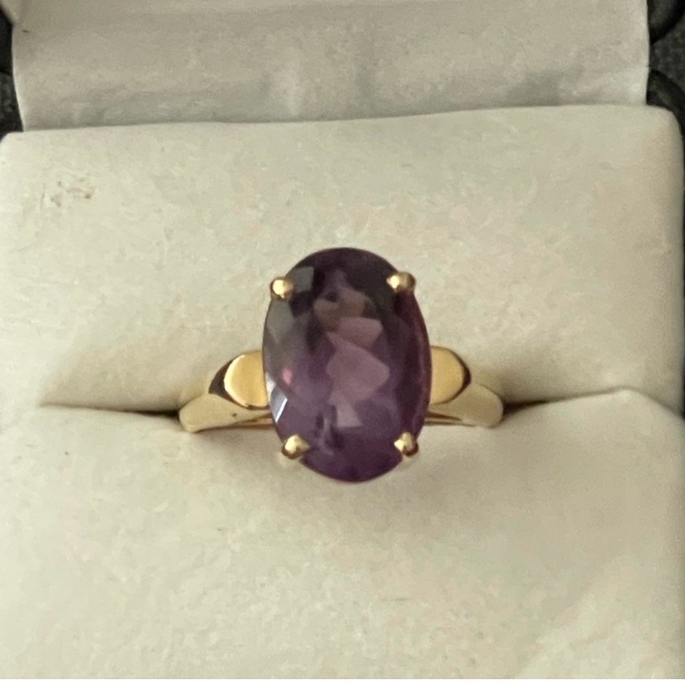 Classic Gold Ring with Oval Purple Gemstone